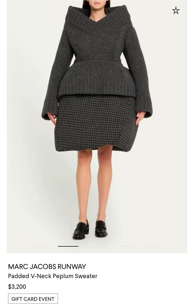 A screenshot of a Marc Jacobs outfit consisting of a sweater and knee length skirt. Both items are heavily padded so the shoulders, bust, and hips are Very Wide, making the model wearing it look like a comically extreme hourglass with toothpick legs. The sweater is $3200.