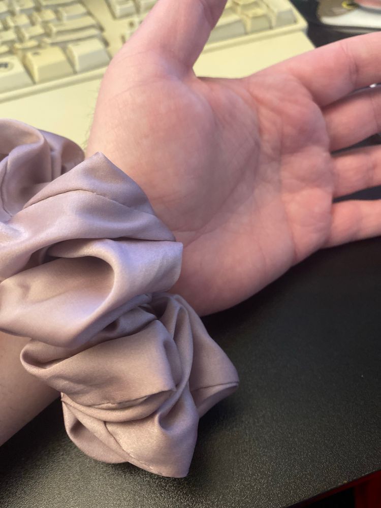 My hand and wrist. Wearing a lavender colored hair scrunchie as a bracelet.