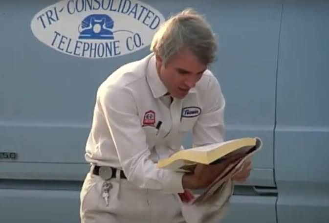 Navin looking at the new phone book, taken from "The Jerk"