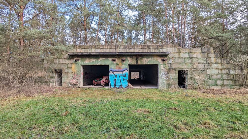 What I assume must have been a vehicle storage bunker now housing farming equipment