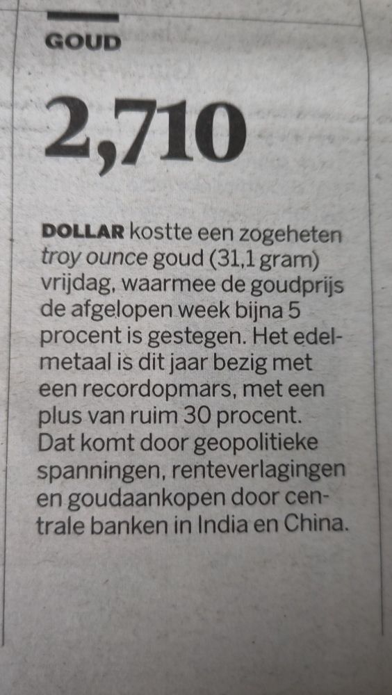 Screenshot kranten-artikeltje, met beginregels: 2,710 dollar kostte een zogeheten troy punce goud (31,1 gram) vrijdag, waarmee de goudprijs de afgelopen week bijna 5% is gestegen.