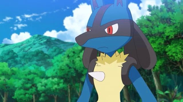 a blue and yellow pokemon with red eyes stands in the woods