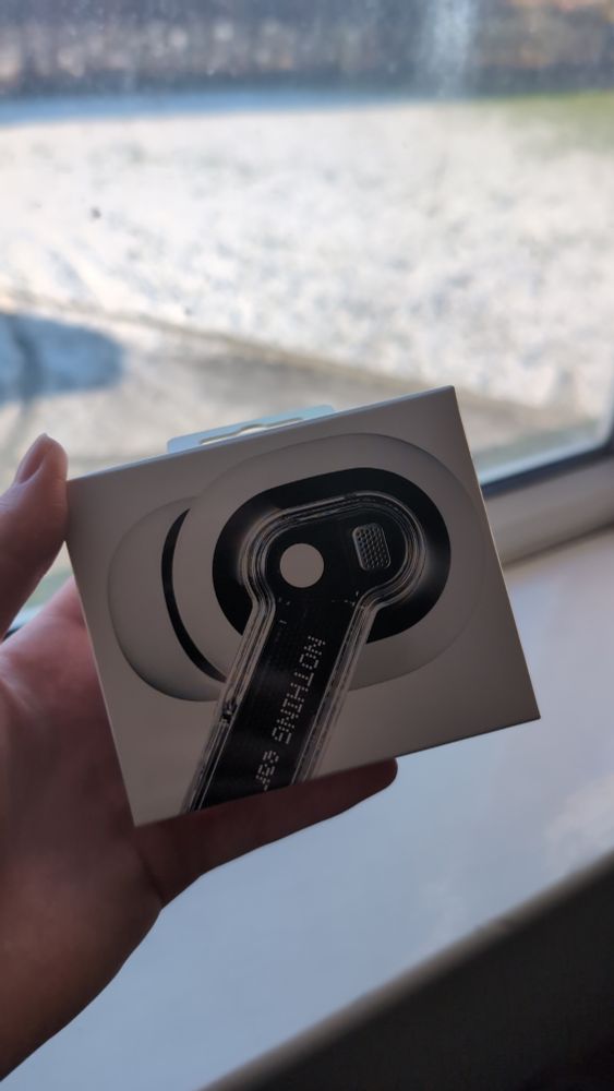 Me holding the box for the Nothing Ears.