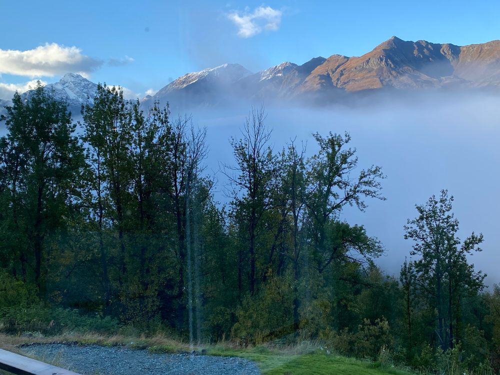 Low clouds moved off the ridge to reveal termination dust in the morning sun. 