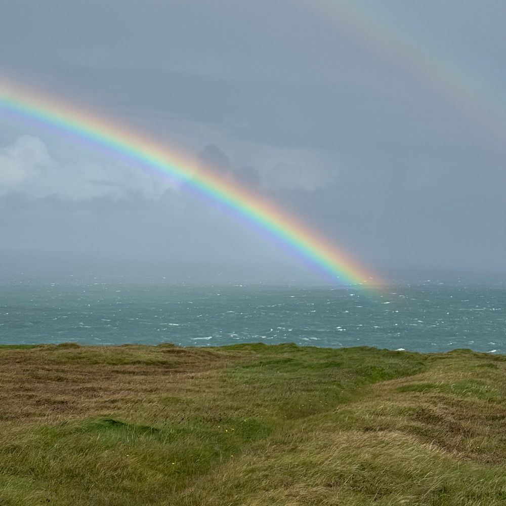 Double rainbow over the Atlantic Ocean in County Clare, Ireland 🇮🇪 🌈 
