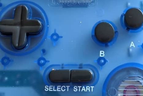 A set of buttons on a game boy color