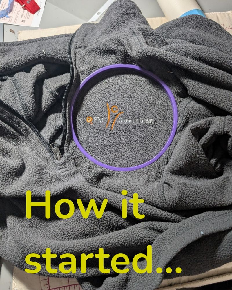 Grey quarter zip fleece with a PNC logo embroidered on the top left.