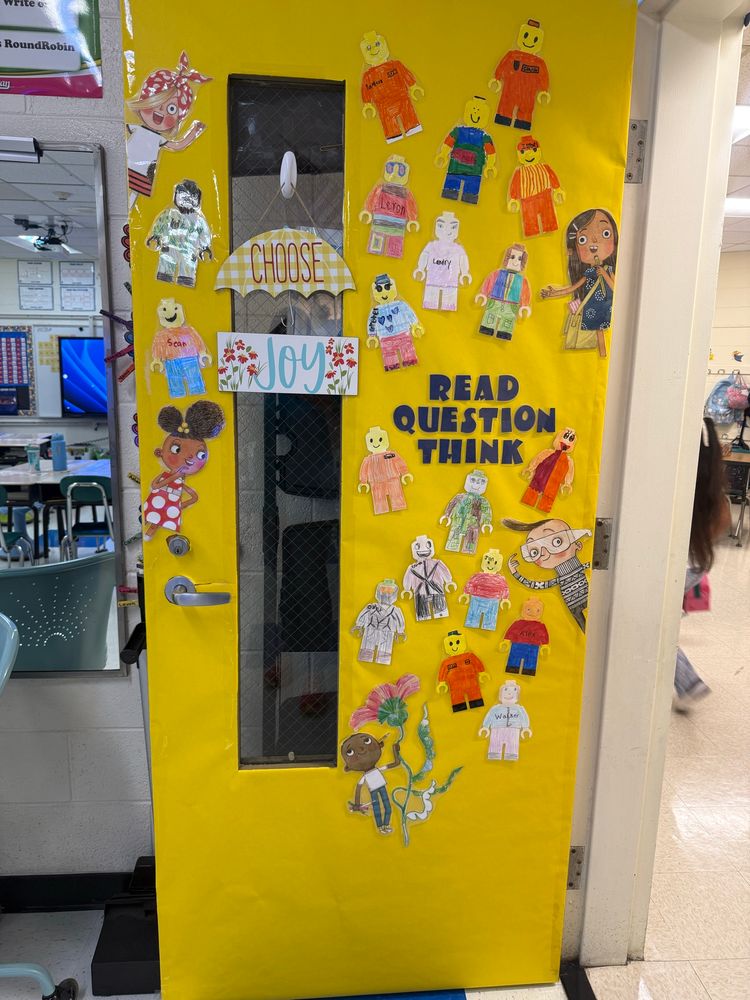 Second grade teacher door decoration with characters from Andrea Beaty’s book