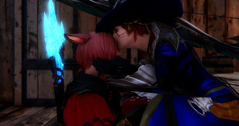 Ethera sitting on top of a crate, G'raha stands in front of her. Ethera leans down and places a gentle kiss on G'raha's forehead.