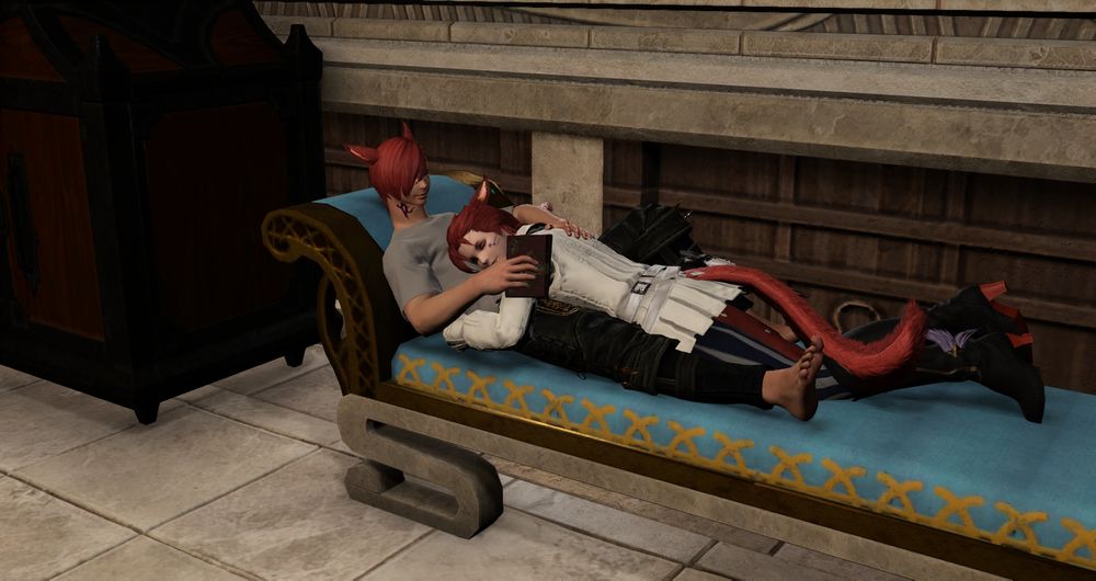 G'raha lounging on a sofa in their room as Ethera lays between his legs and rests her head on his abdomen.