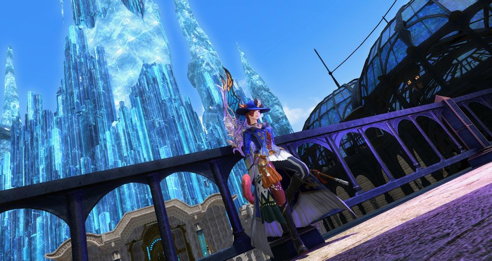 Ethera posing along the railing of the Crystarium with the Crystal Tower behind her.