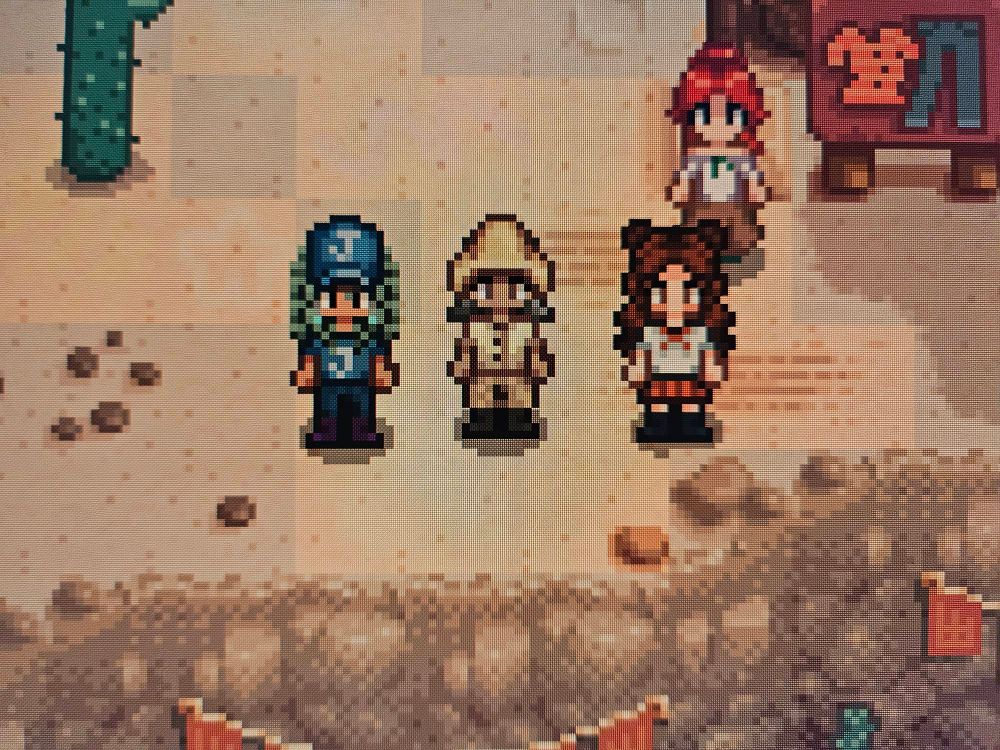 Lyrae has a blue Joja hat, shirt and pants on. Kuya has on an all yellow sailor/mariner outfit. Fable has on a red school girl outfit.