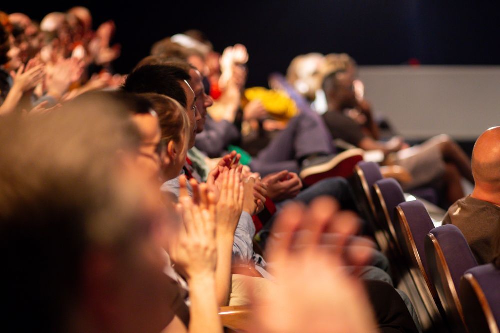 An side view of an audience applauding.

Reframing Film Sessions 2024 c/o Chelsey Cliff.
