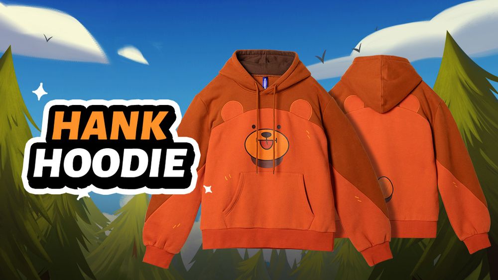 A picture depicting a hoodie over an illustrated background. We see an orange hoodie that has the shape of Hank the bear on the front, including arms down the sides. Behind it we see the back of the hoodie, including a tail. Text next to it reads "Hank Hoodie"