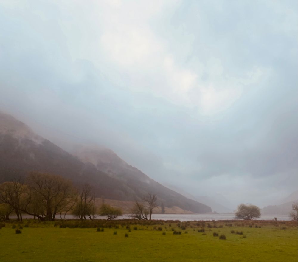 Loch Doine surrounded by mountains and clouds