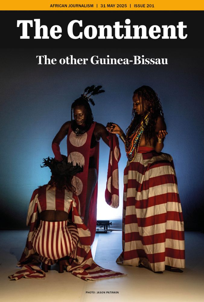 The cover of Issue 201 of The Continent shows the members of Aurora Negra Collective performing at the Bissau Biennale. They're dressed in striped red and white clothing and backlit by a white light. The picture is by Jason Patinkin. 