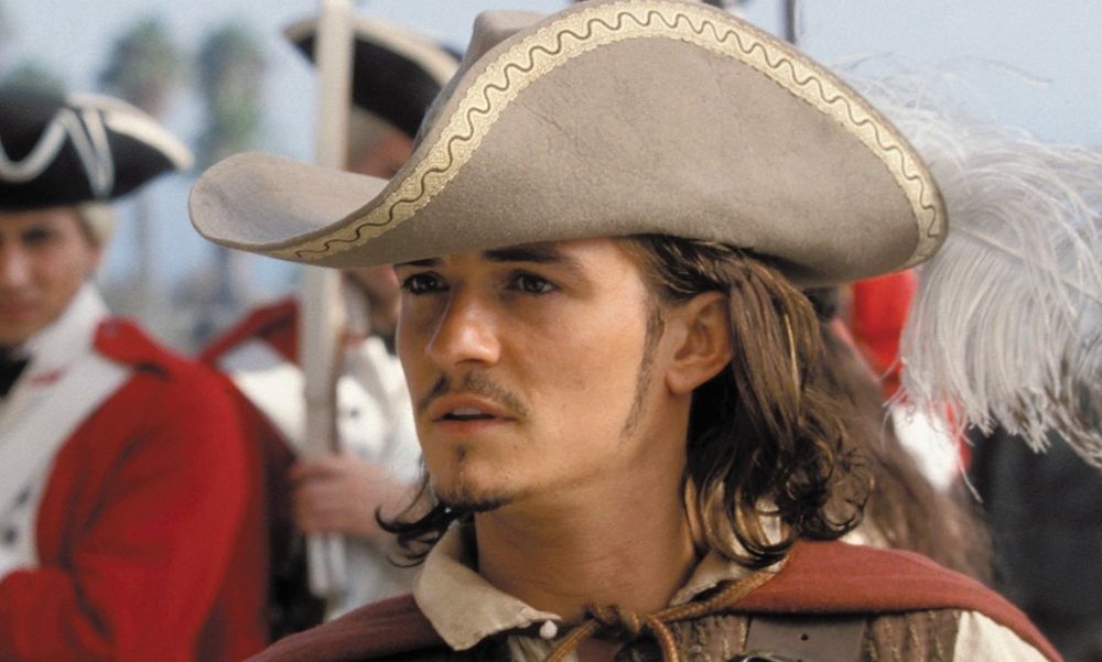 Will Turner from pirates of the Caribbean with his fancy feathered hat, signifying his transition from good boy to outlaw