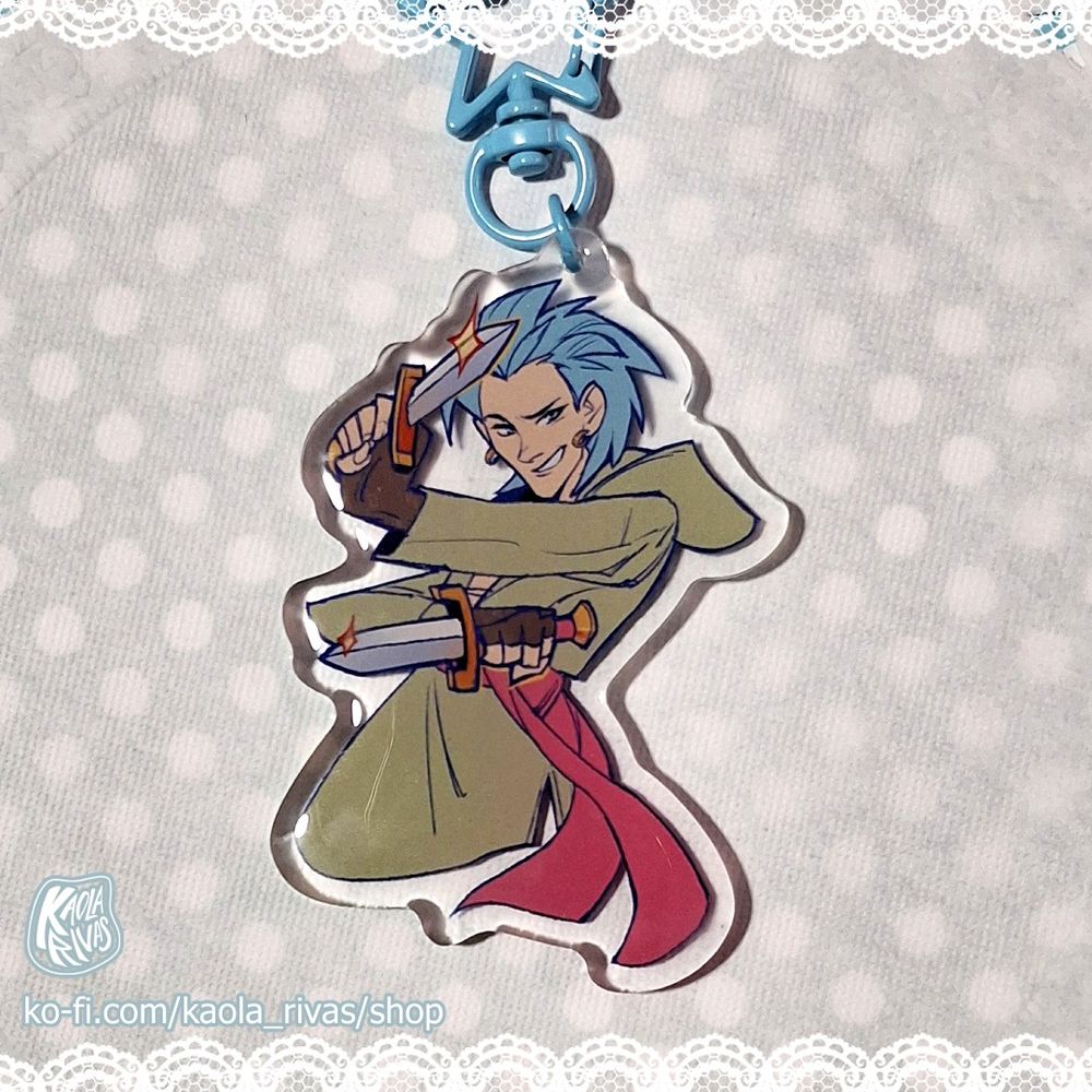 An acrylic Keychain of Erik from Dragon Quest 11. 
