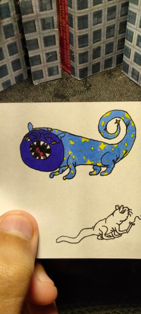 The ferocious wizard hat cat. A wizards hat which has legs, a tail, ears, teeth and eyes on the prowl for anything magical. 

Below it is an unfinished doodle of mouse with a wand. 