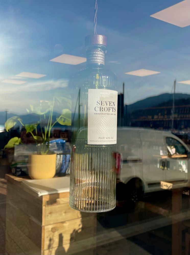Seven Crofts gin bottle with ribbed glass. Seen in shop window. 