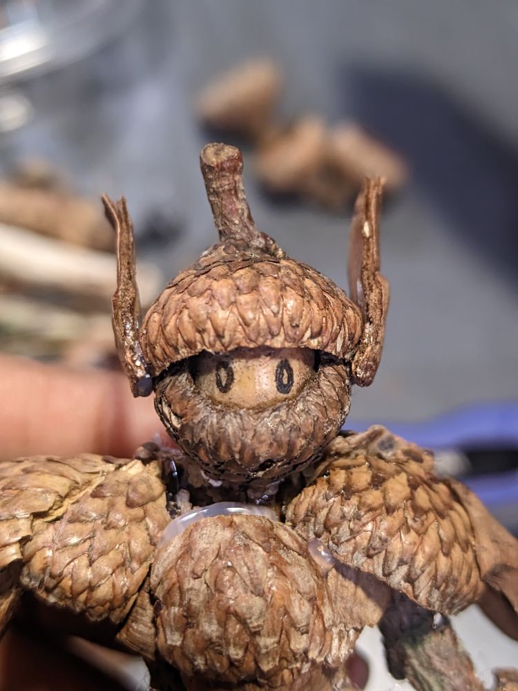 A little knight made of Acorns. He has a little helmet and a chestplate and ears.