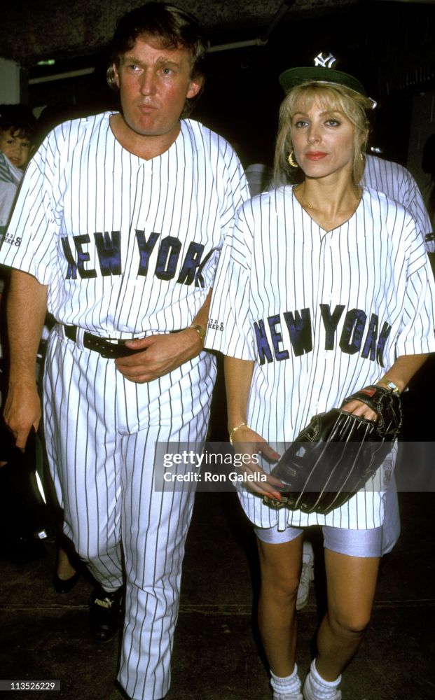 Donald Trump and Marla Maples (his lesser known second wife and mother of Tiffany) during a softball event, both sporting full 'yankees' uniforms