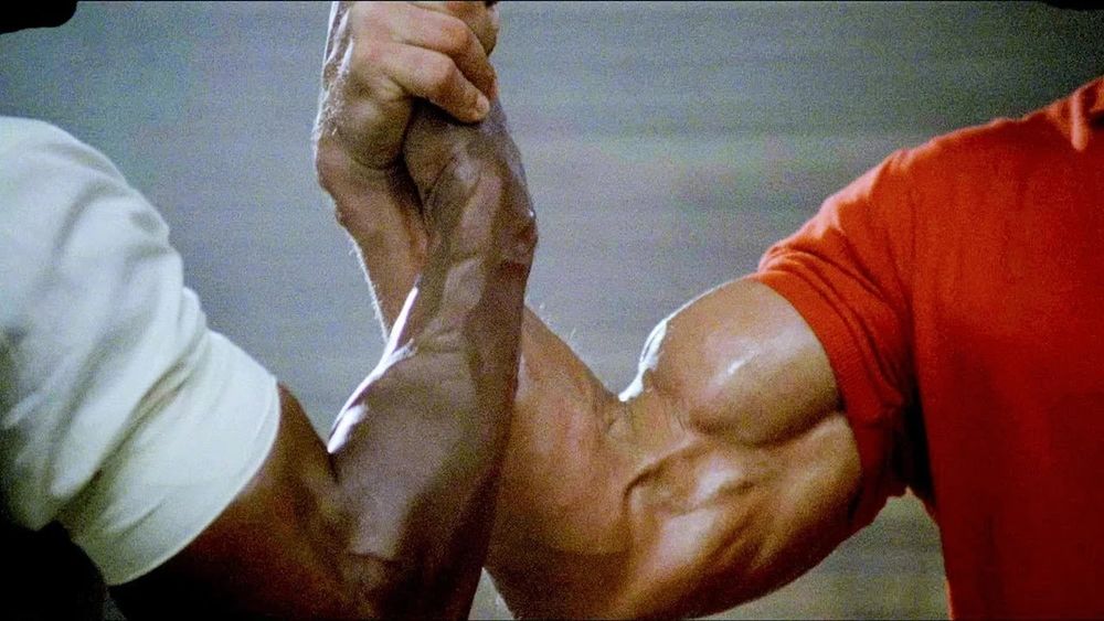 Dutch and Dylan shaking hands in Predator