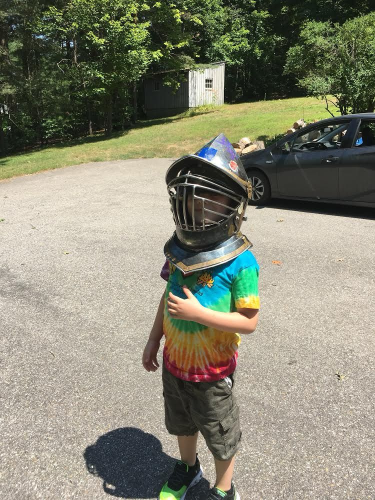 A 6 year old in a steel burgonet