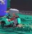 A very blurry screen cap of the new Splatoon trailer showing the new dread wringer player from behind. Attempting to look at the sub-line.