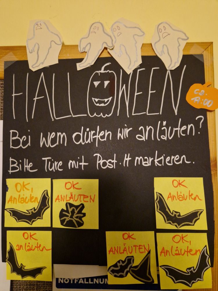 A Poster with Post-Its to take and put on your door to indicate if you want Kids to come trick-or-treating at your door.