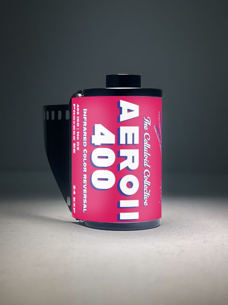 A roll of Aerochrome film by Kodak. Discontinued in 2009, this infrared film is known for its unique ability to render infrared light as red and visible green light as blue. This produces a distinctive, often surreal, color palette, with green vegetation appearing in shades of red and pink. It was initially developed for military use in aerial reconnaissance and camouflage detection
