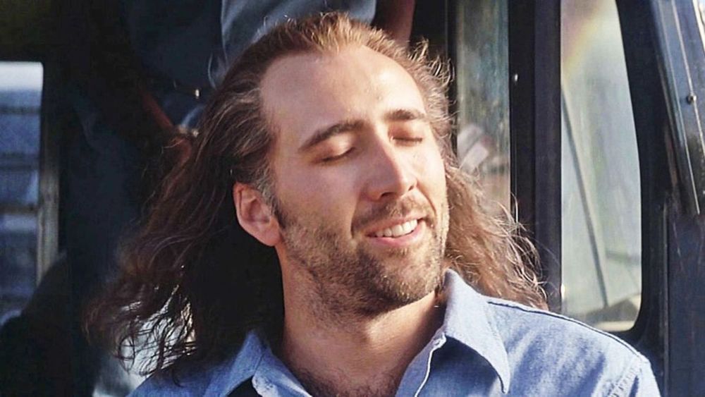 Nic Cage from Con Air where he feels the sweet wind of freedom on his face