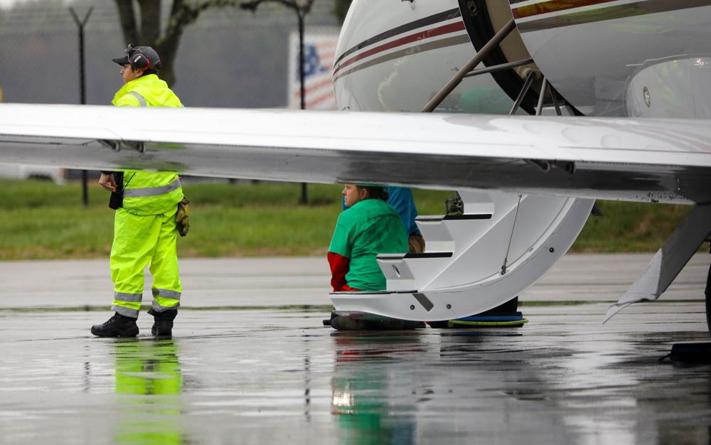 Protesters block private jets at Hanscom Airfield