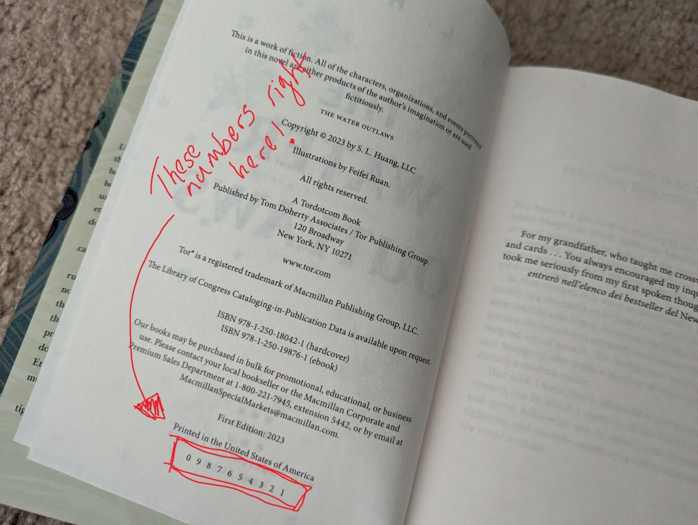 The copyright page of THE WATER OUTLAWS with a line at the bottom reading "0 9 8 7 6 5 4 3 2 1". It's boxed in red with a note that says "These numbers right here!"