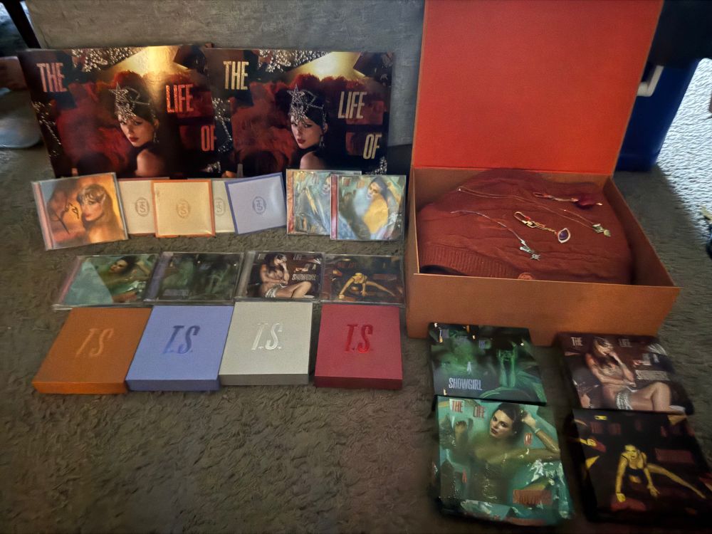 The life of a showgirl, merch collection everything laying together 