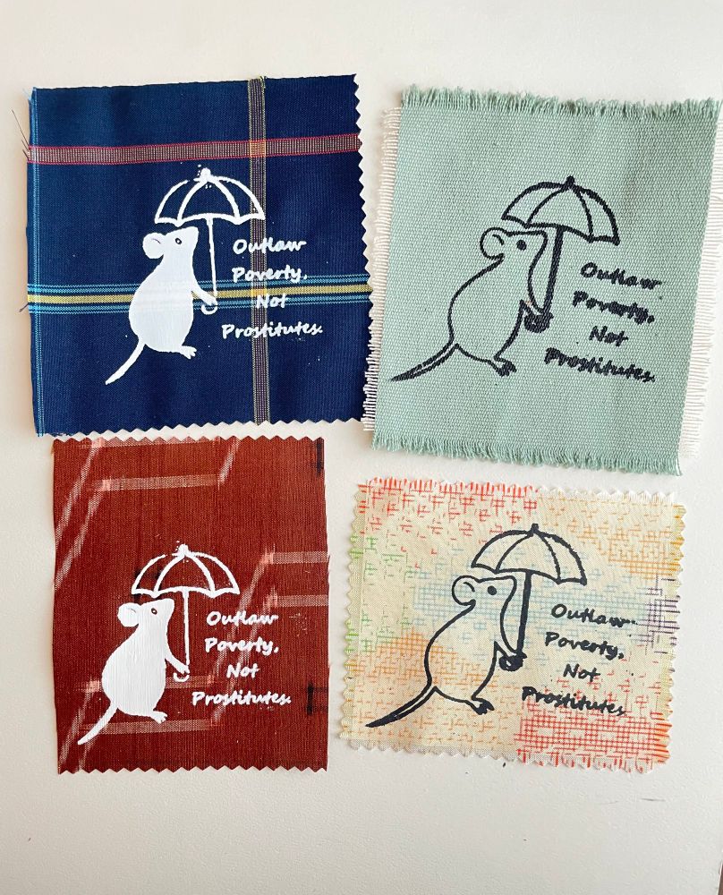 パッチの画像4種。生地は和柄、キャンパス地などのデッドストックのもの。ねずみが傘をさしている。傘の下にテキストあり
「Outlow Poverty,Not Prostitutes.」世界的に有名なテキスト。
意味は「セックスワークを非合法にするのではなく、貧困を非合法に」