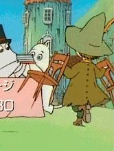 Gif from the 90s moomin japanese intro, snufkin is jumping back and forth with two chairs in hand as the moomin family sets up the dining table. 