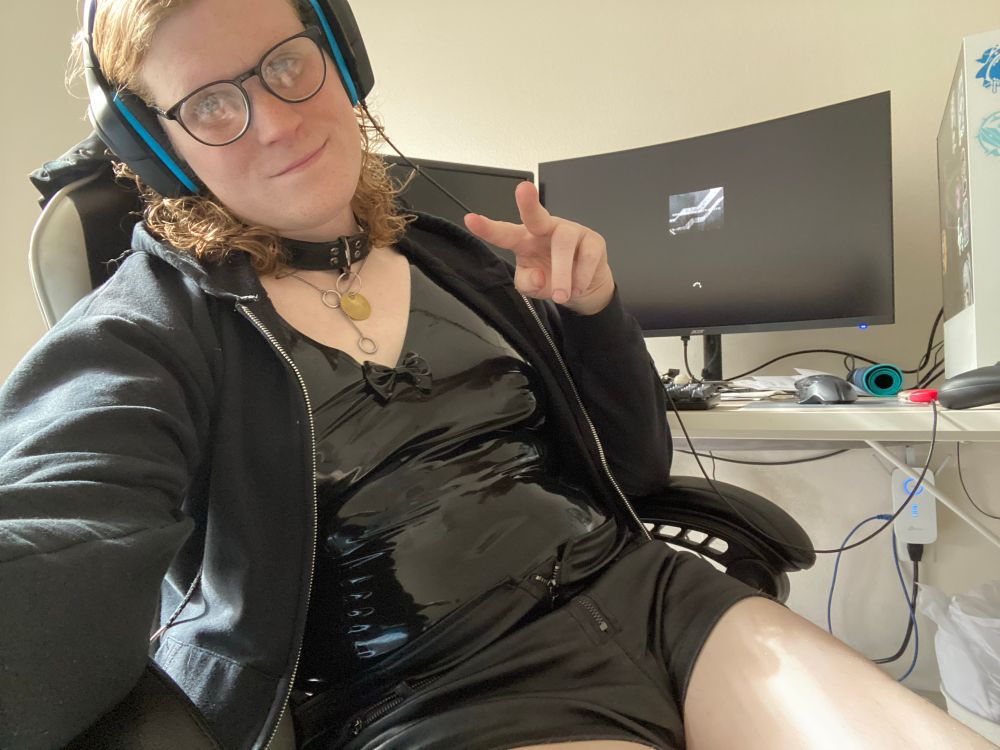 Sky selfie in front of her computer 