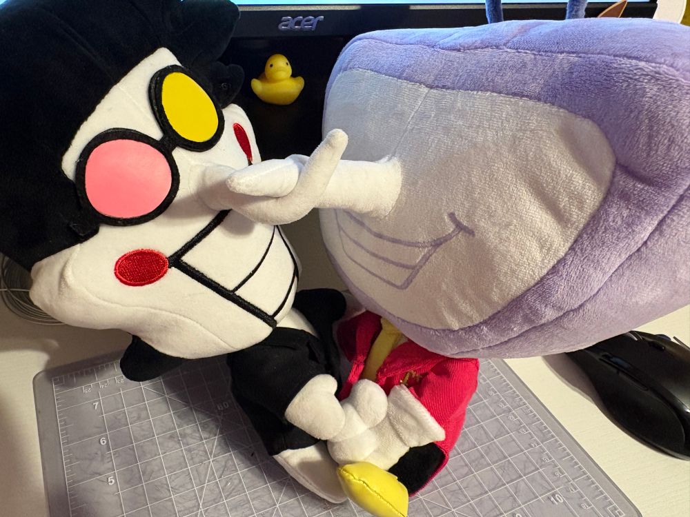 spamton and tebna with their noses twisted together