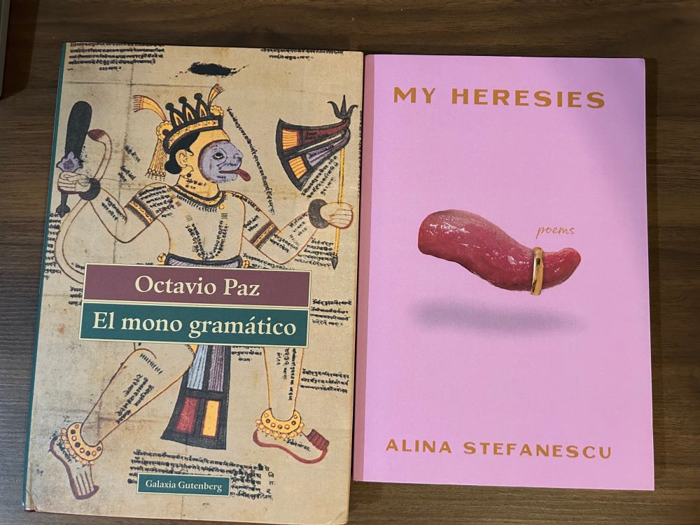 Two books side by side: El mono gramatico by Octavio Paz and My Heresies by Alina Stefanescu.