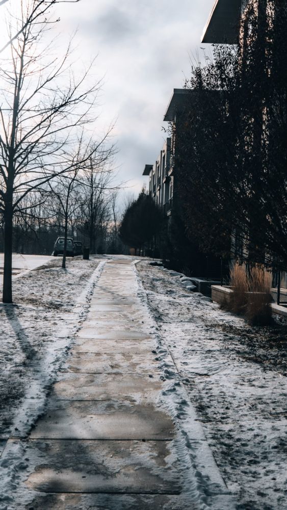 A recently salted walkway outside of an apartment complex. 