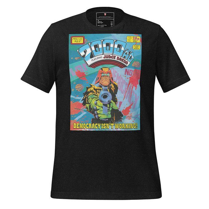 A black shirt with a print of John Higgin's classic 2000 AD cover featuring Judge Dredd. The slogan says "Democracy isn't working!"