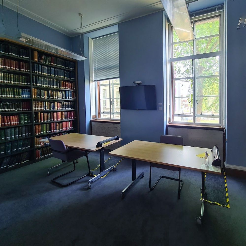 Image of one of the cooler rooms in the IHR on the north (tree facing) side of the building. The basement reading rooms also remain comparatively cool.