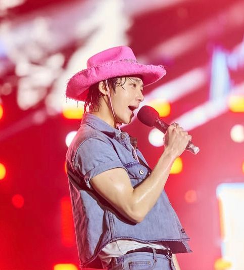 Monsta x Hyungwon performing on stage at waterbomb 