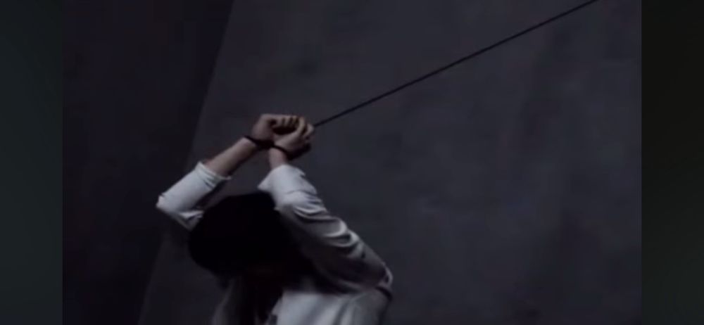 Minhyuk with his wrists tide up in Baby Blue teaser 