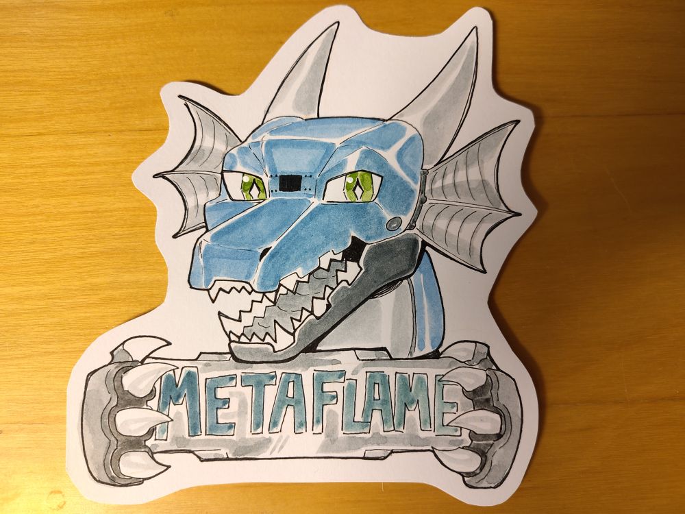Photo of a traditional-art headshot of a blue robot dragon. It has a happy excited expression, and in its paws it's holding a metal plaque reading METAFLAME.