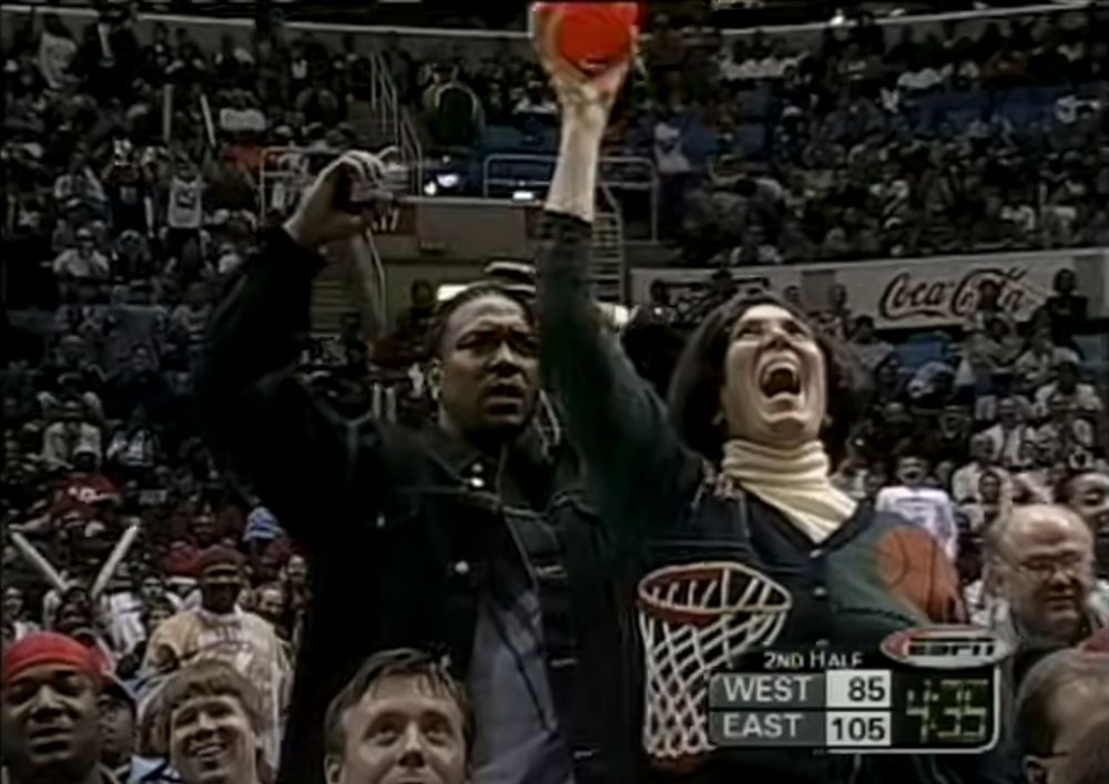Looks like this is Big Meech of BMF at McDonald's All American game where Lebron James is playing back in 2003