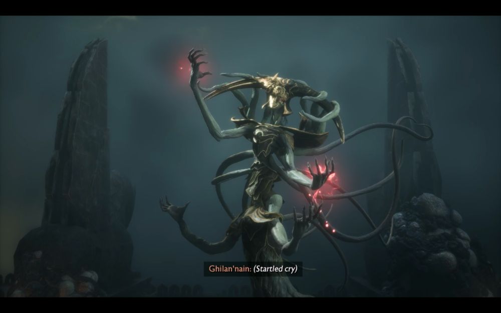A screenshot from Dragon Age: The Veilguard. A wide-view shot of Ghilan'nain, the ancient elven goddess of medical ethics, stnading between two stone pillars that are only slightly taller than she is.

She has greenish-gray skin and twisted, elongated proportions. Also, tentacles, some of which writhe in pain, flowing out behind her. Others drape lazily over the long horns that curve out from her ornate, black and gold helmet. The helmet has a golden mask that entirely covers her face. She wears a matching breastplate with wide, curving pauldrons.

Writhing in pain, she holds up all four of her arms and prepares to attack. Red light, signifying magic, swirls around her absolutely massive hands and their long, thick fingers. Baby, please, just let me hold your perfect, perfect hands. I would never stop you from being a little silly and doing atrocities or whatever.