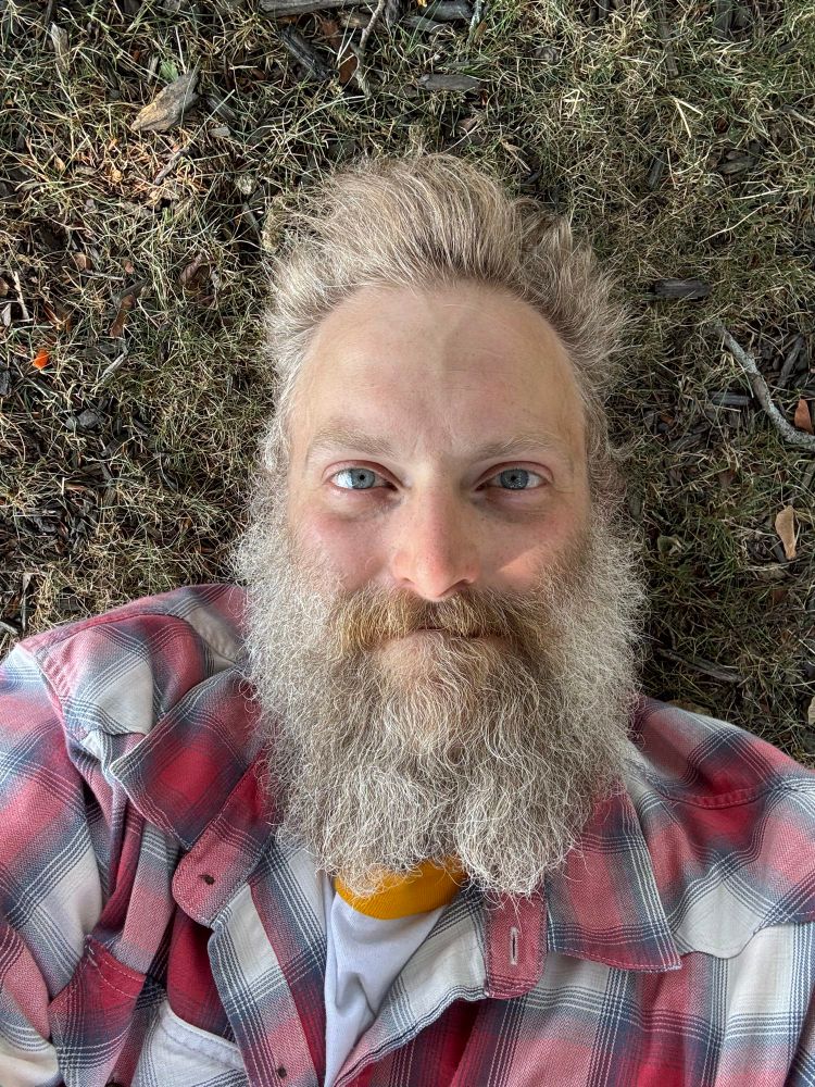 A selfie I took while lounging around at the park yesterday.