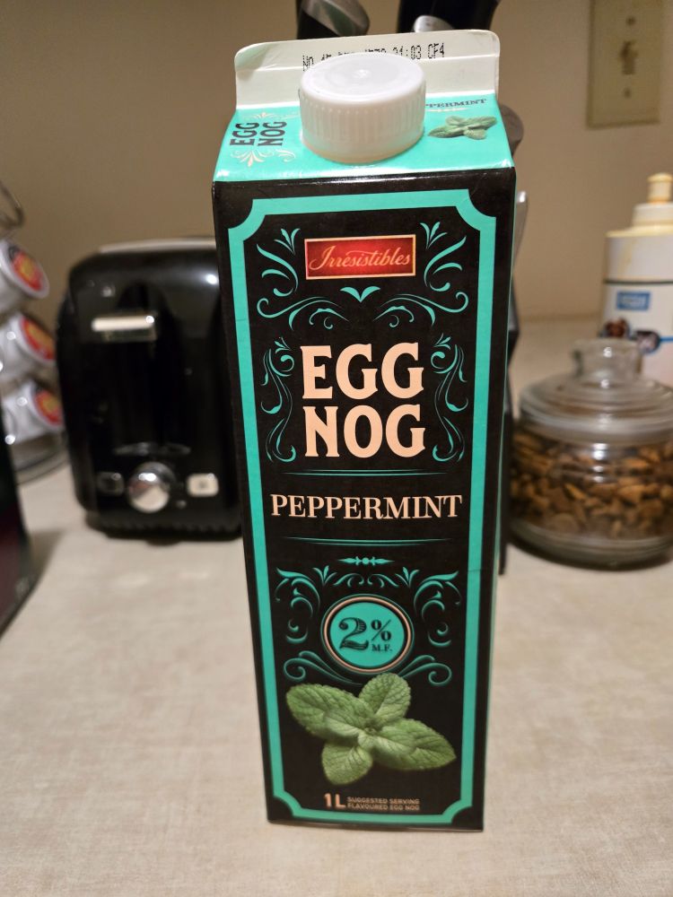 A picture of a carton of Peppermint flavored egg nog.